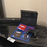 PlayStation 4 Console, Controller, Game, and LG Soundbar - thumbnail 11 of 12