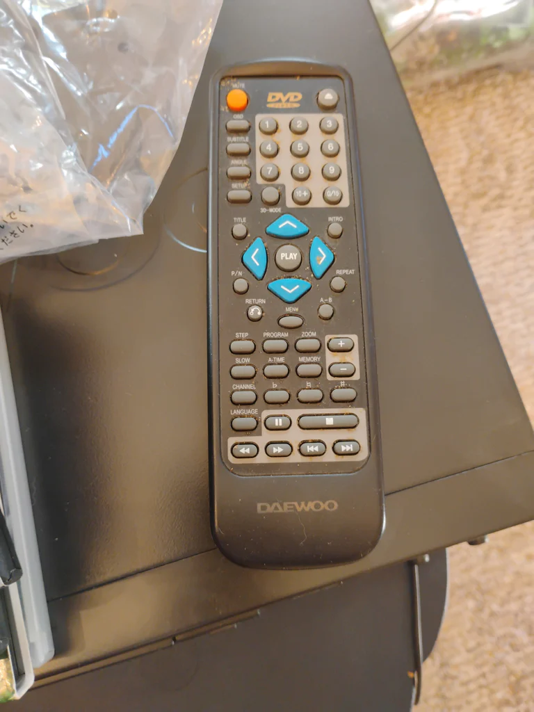 Daewoo DVD Player and Assorted DVDs - image 4 of 4