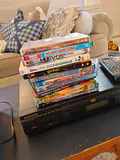 Daewoo DVD Player and Assorted DVDs - thumbnail 1 of 4