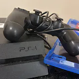 PlayStation 4 Console, Controller, Game, and LG Soundbar - thumbnail 2 of 12