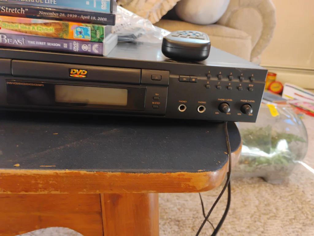 Daewoo DVD Player and Assorted DVDs - image 3 of 4