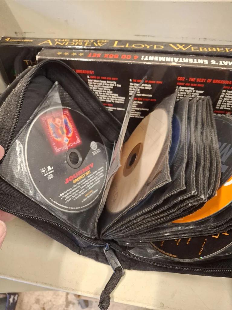 Collection of Music CDs and Disc Storage Cases - image 10 of 22