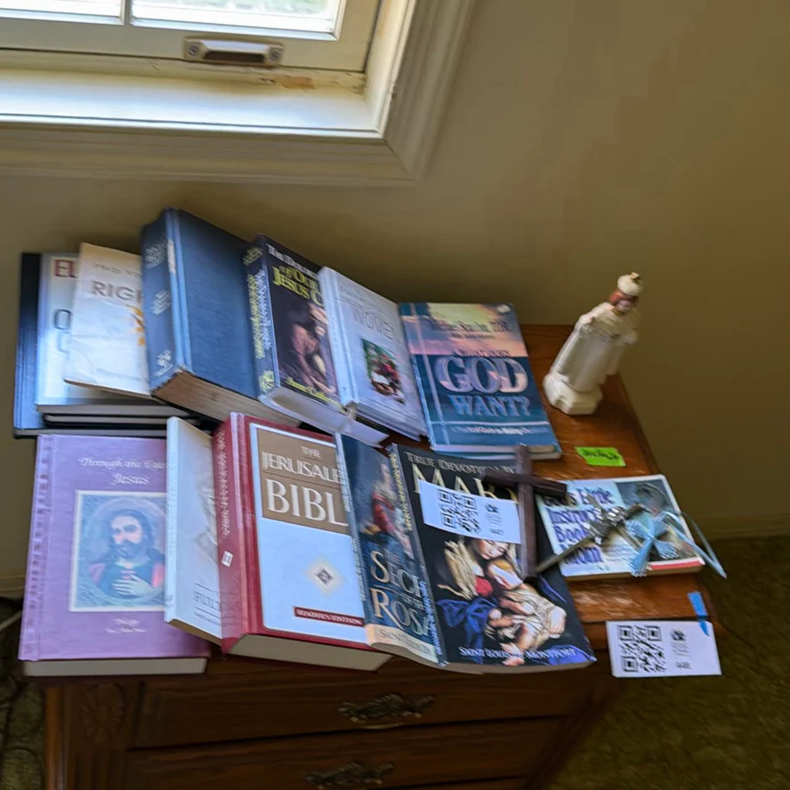 Religious Books, Crosses, and Figurine - image 1 of 8