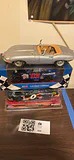 Die-Cast Model Cars Including Jaguar Roadster and NASCAR Replicas - thumbnail 1 of 10