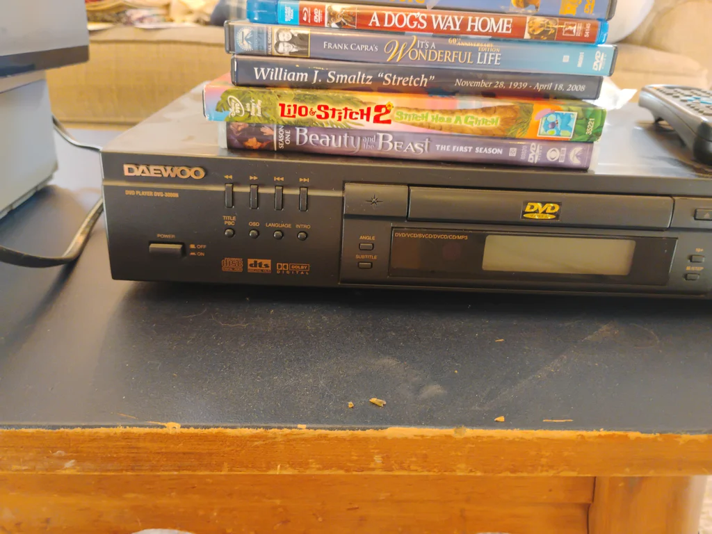 Daewoo DVD Player and Assorted DVDs - image 2 of 4