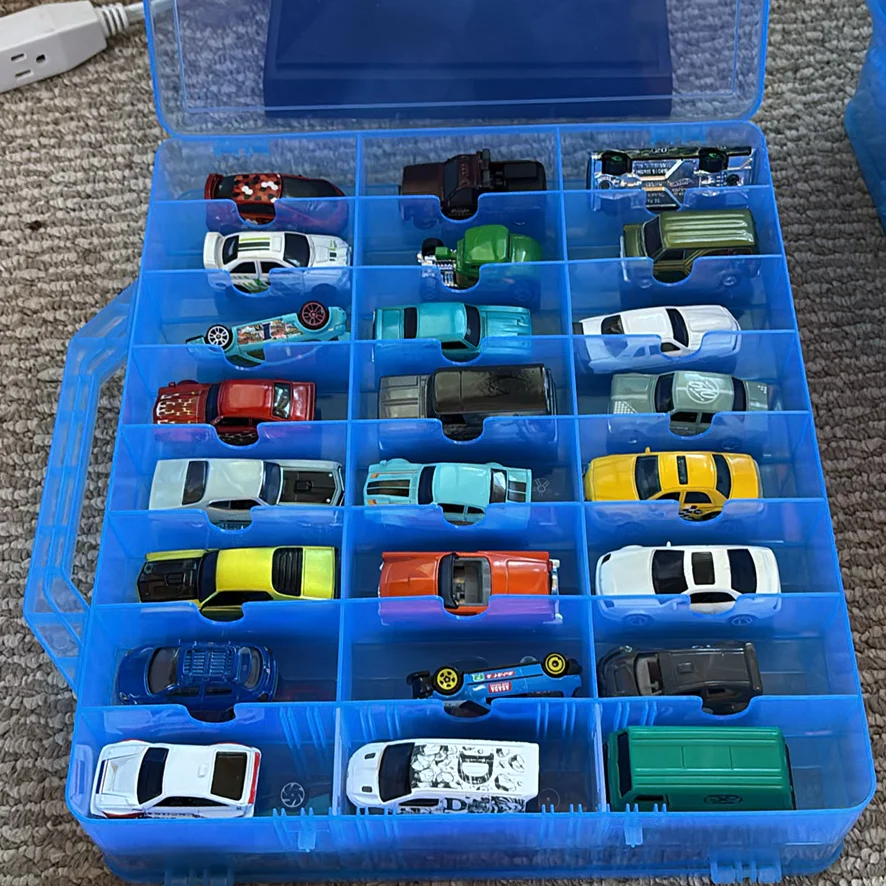 Collection of Die-Cast Toy Cars and Trucks in Storage Case - image 1 of 33