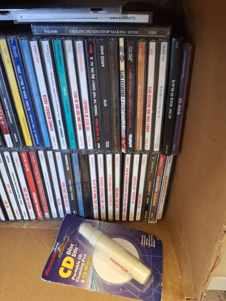 Collection of Music CDs and Disc Storage Cases - image 20 of 22