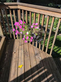 Metal Plant Stand with Wicker Planter and Flowers - thumbnail 1 of 4