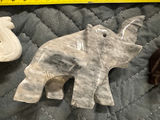 Collection of hand-carved elephant figurines in multiple colors - thumbnail 10 of 13