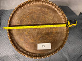 Round metal serving tray on wooden pedestal stand - thumbnail 2 of 3