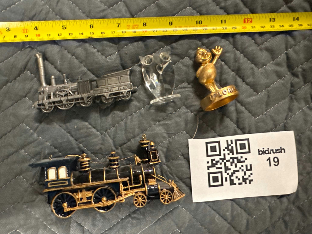 Collection of miniature trains and decorative figurines - image 1 of 4