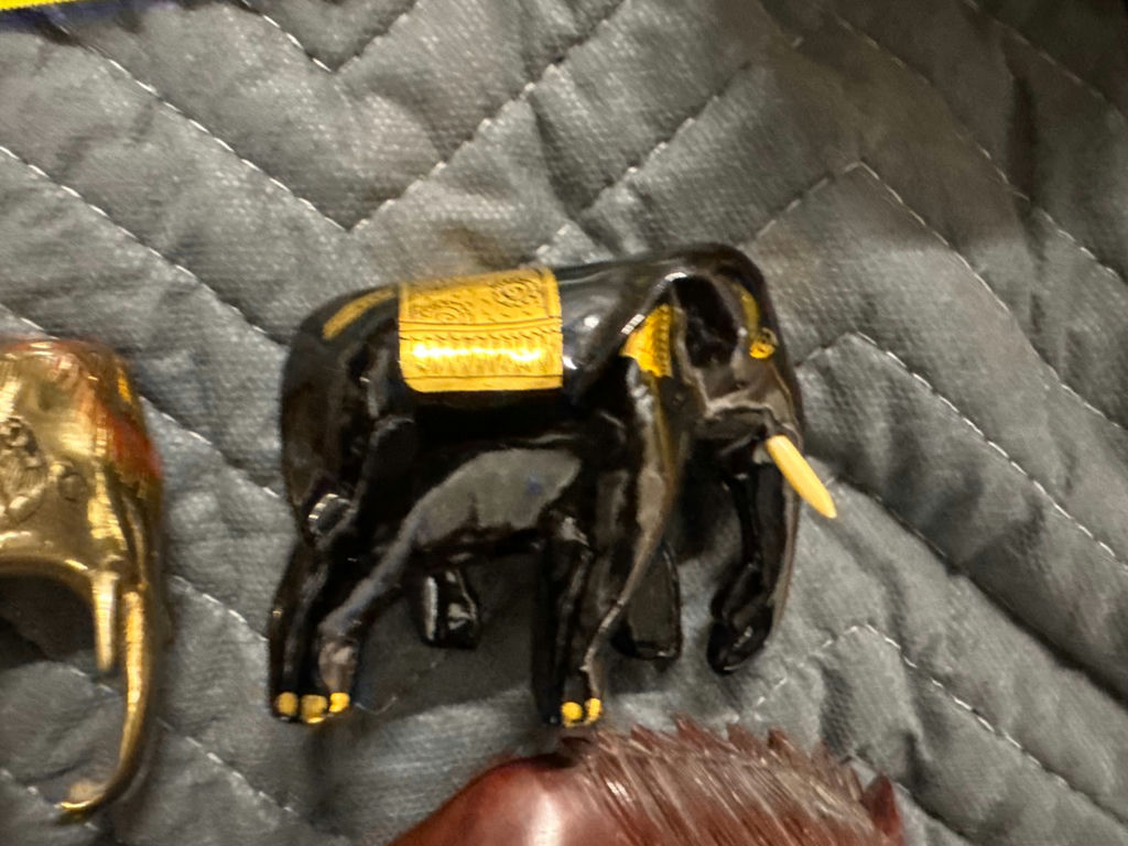 Assorted carved animal figurines including elephants and horse - image 6 of 10