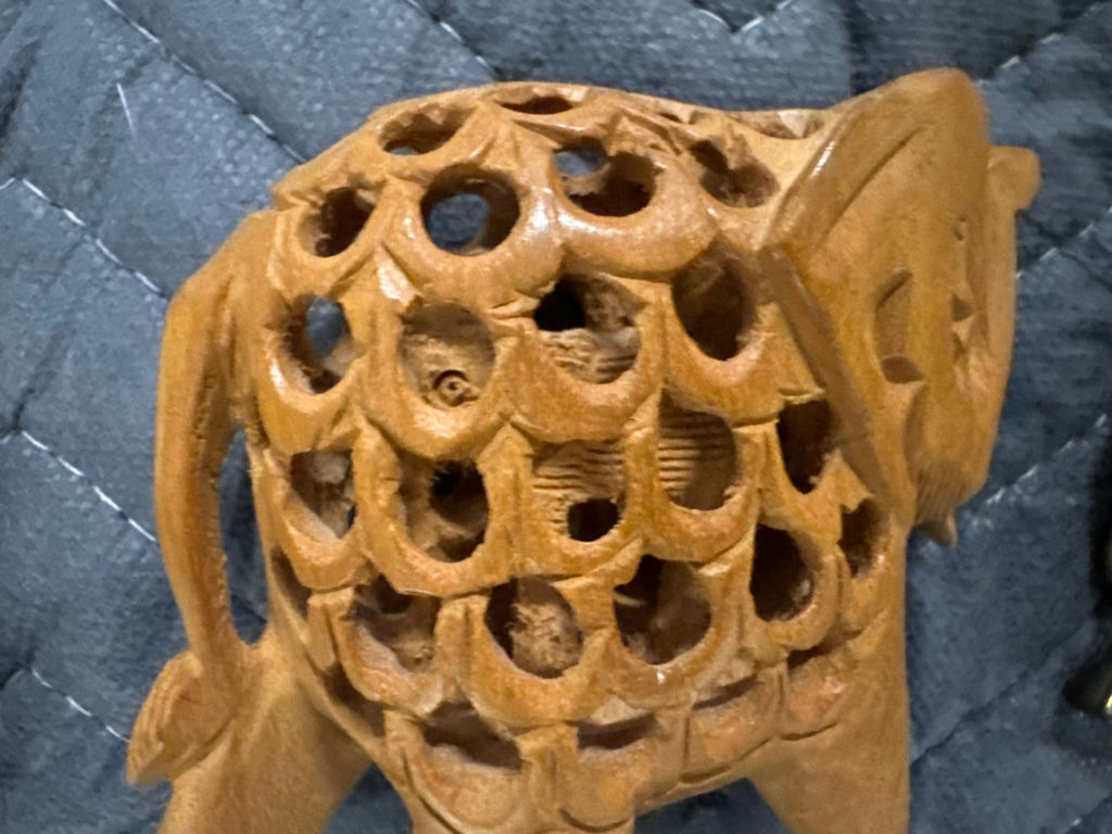 Assorted carved animal figurines including elephants and horse - image 4 of 10
