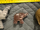 Collection of hand-carved elephant figurines in multiple colors - thumbnail 9 of 13