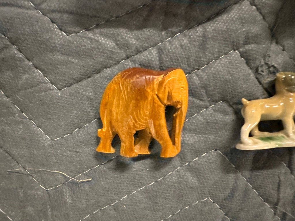 Assorted carved animal figurines including elephants and horse - image 10 of 10