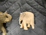 Collection of hand-carved elephant figurines in multiple colors - thumbnail 6 of 13