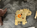 Collection of hand-carved elephant figurines in multiple colors - thumbnail 3 of 13