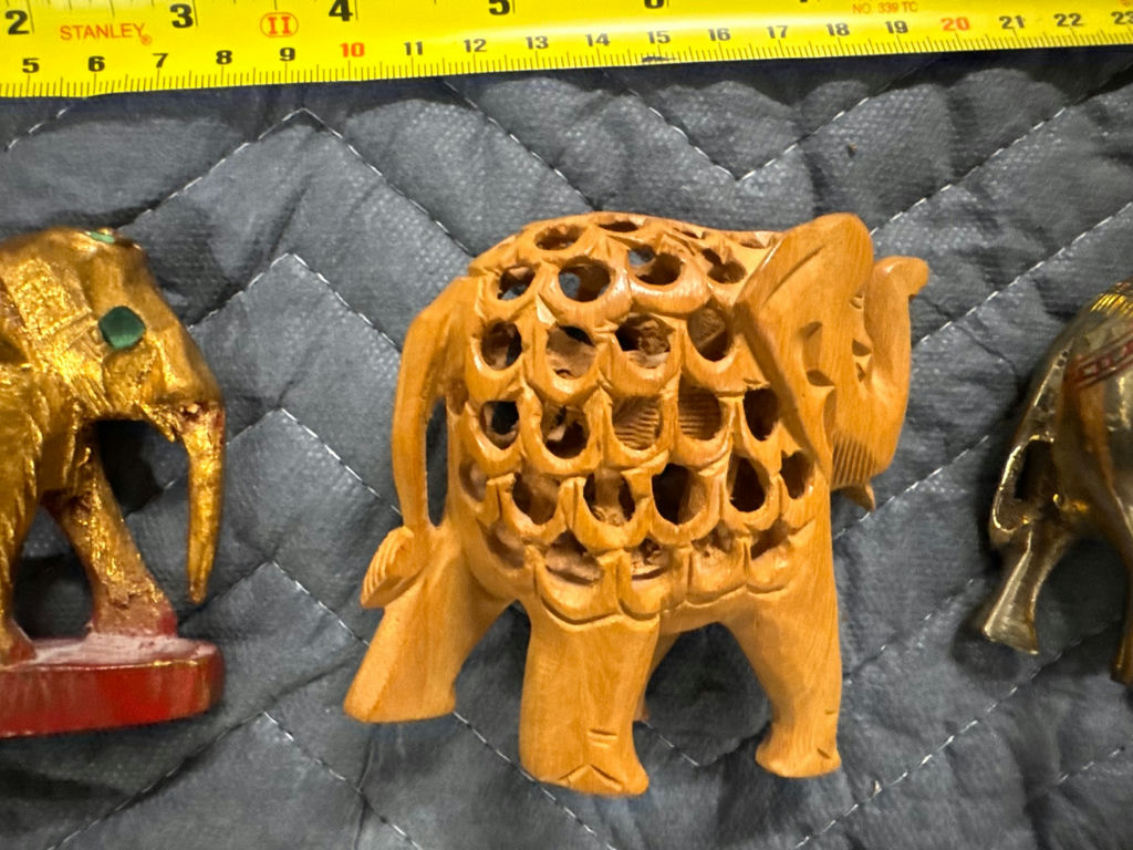 Assorted carved animal figurines including elephants and horse - image 3 of 10