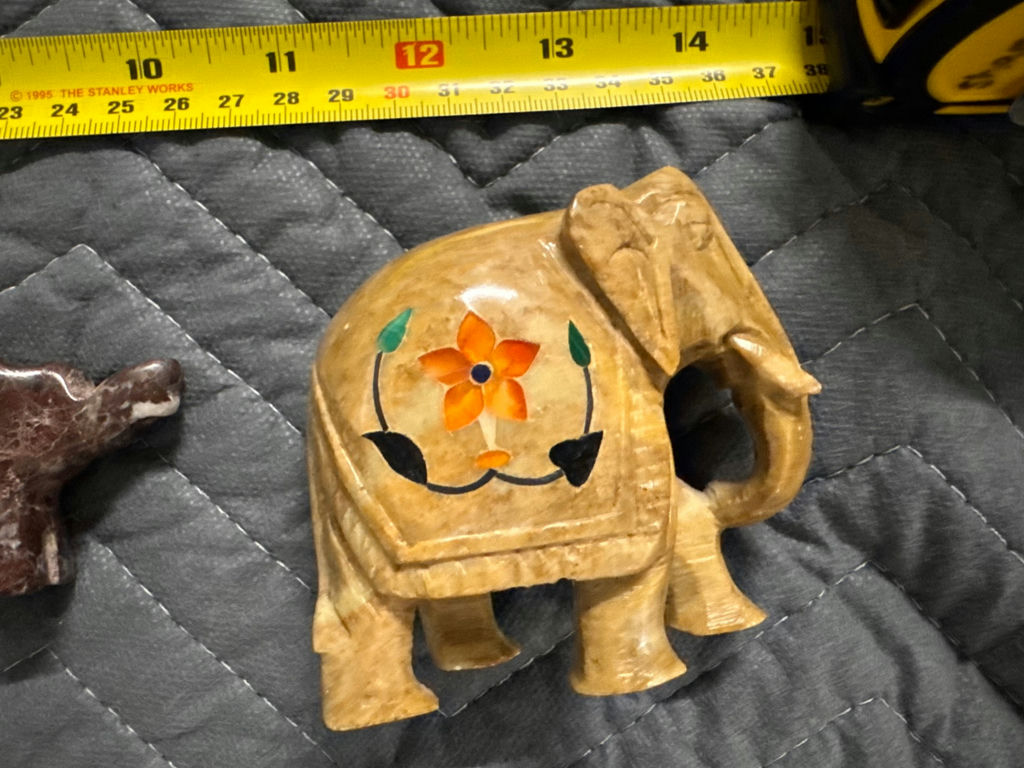 Collection of hand-carved elephant figurines in multiple colors - image 8 of 13
