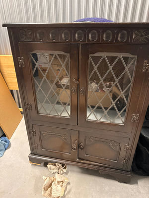 Dark wood cabinet with diamond-paned glass doors - Image 1 of 5