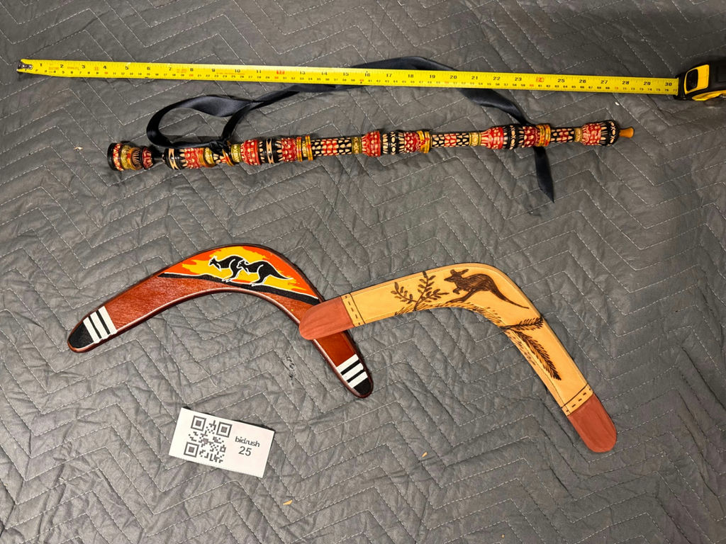 Decorative Wooden Boomerangs and Carved Didgeridoo - image 1 of 5