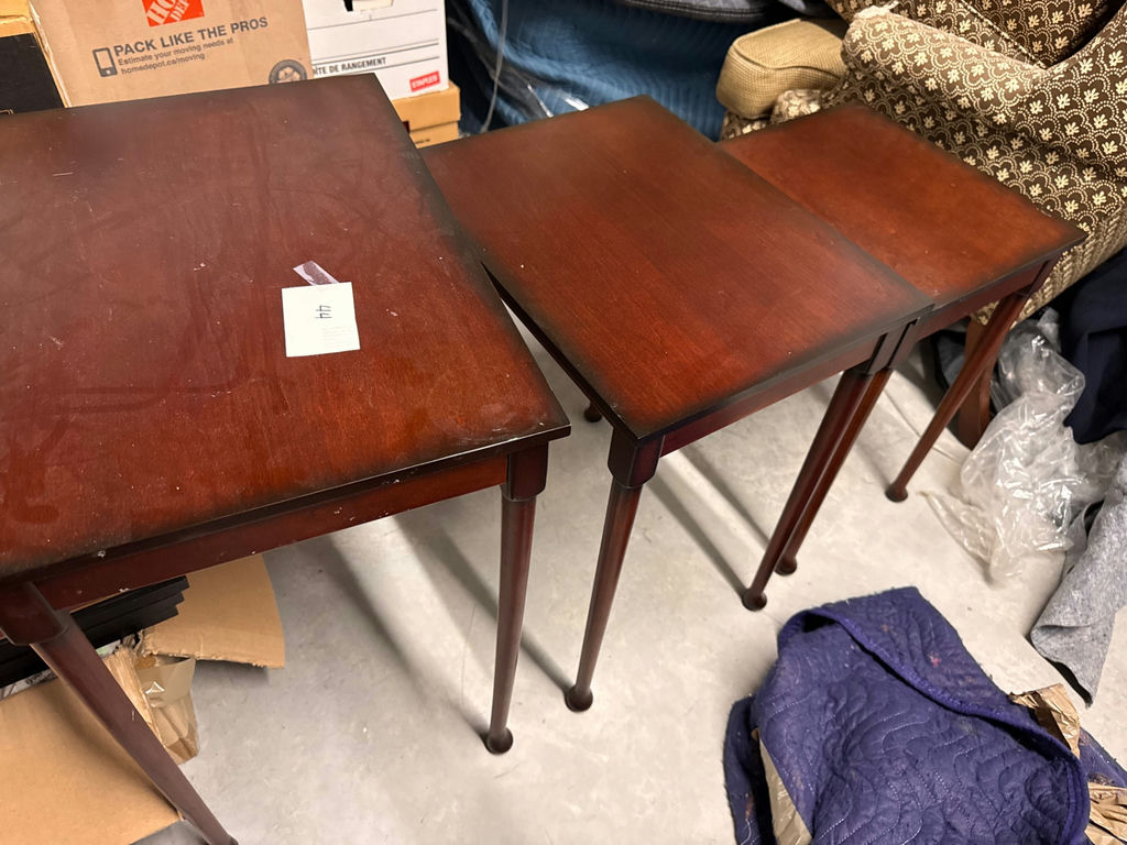 Set of three matching dark wood nesting tables - image 1 of 4