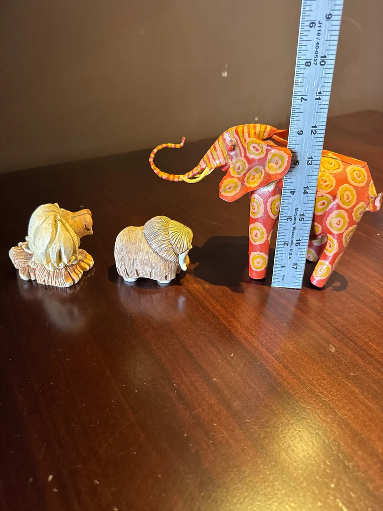 Hand carved animal figurines: painted elephant and carved lion - image 7 of 7
