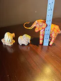 Hand carved animal figurines: painted elephant and carved lion - thumbnail 7 of 7