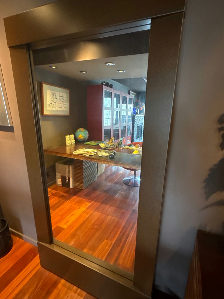 Dark metal-framed floor mirror - image 1 of 3