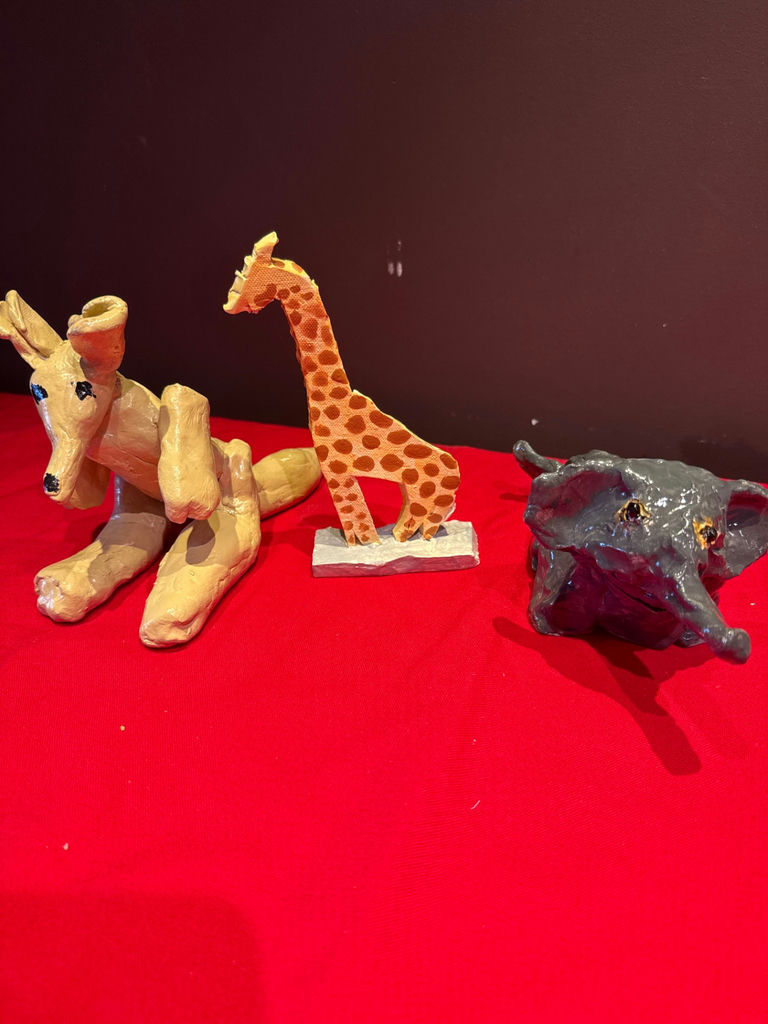 Handmade animal sculptures: giraffe and dogs - image 1 of 7