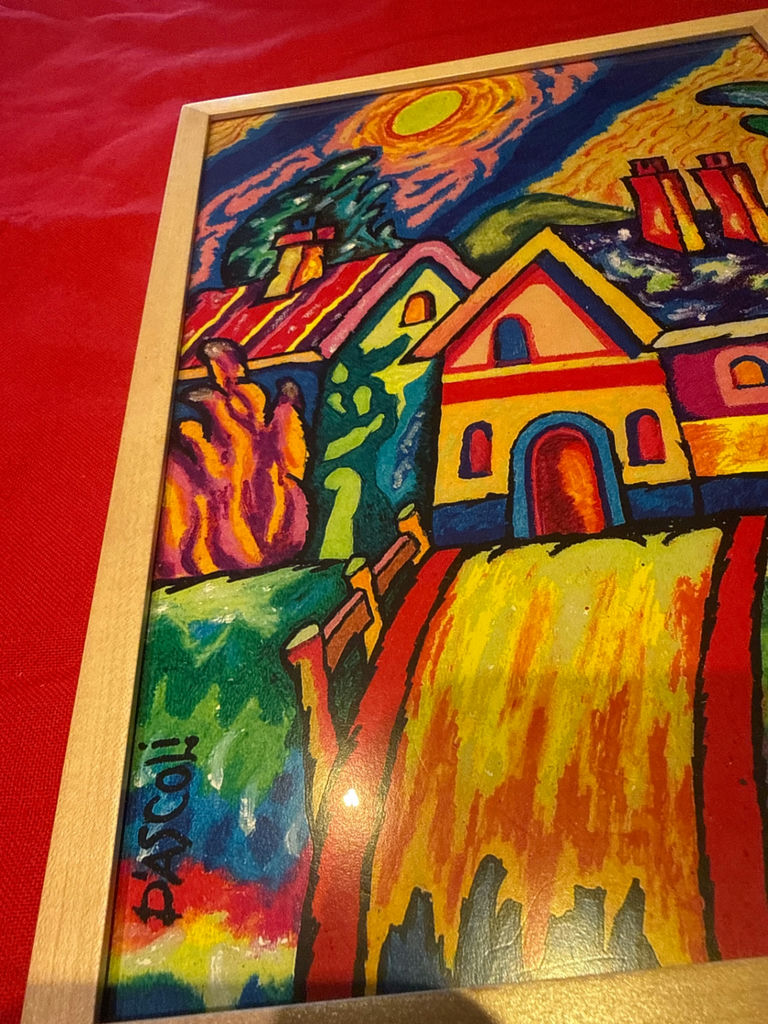 Framed colorful village scene painting - image 2 of 3