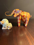 Hand carved animal figurines: painted elephant and carved lion - thumbnail 1 of 7