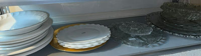 Stacked white ceramic plates with glass and crystal serving dishes - Image 1 of 6