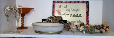Assorted decorative shelf items: glassware, ceramics, sign and cork figurines - Image 1 of 6