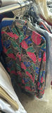 Assorted women's clothing on a rack - thumbnail 13 of 13