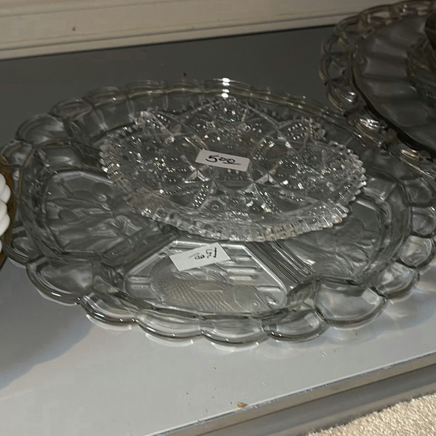 Stacked white ceramic plates with glass and crystal serving dishes - image 5 of 6