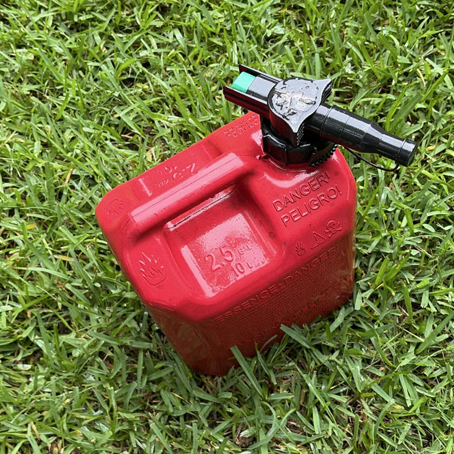 Red Black Max pressure washer with Honda engine and two red gasoline cans - image 5 of 6