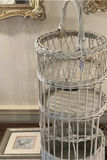 White Wicker Multi-Tier Basket with Framed Floral Art and Ornate Mirrors - thumbnail 3 of 4