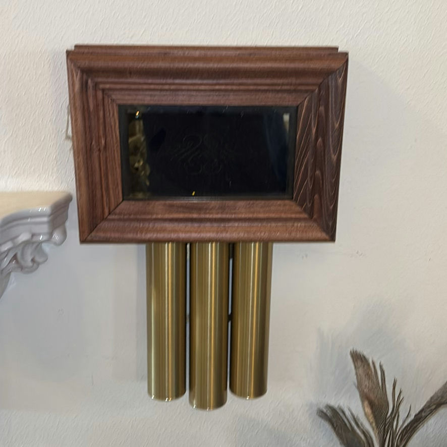 Deer wall art, brass-weight pendulum clock, and ornate corbel shelf - image 2 of 4