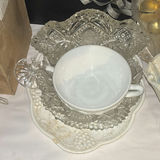 Assorted decorative glassware, ceramics, and a gold bell wreath - thumbnail 5 of 6