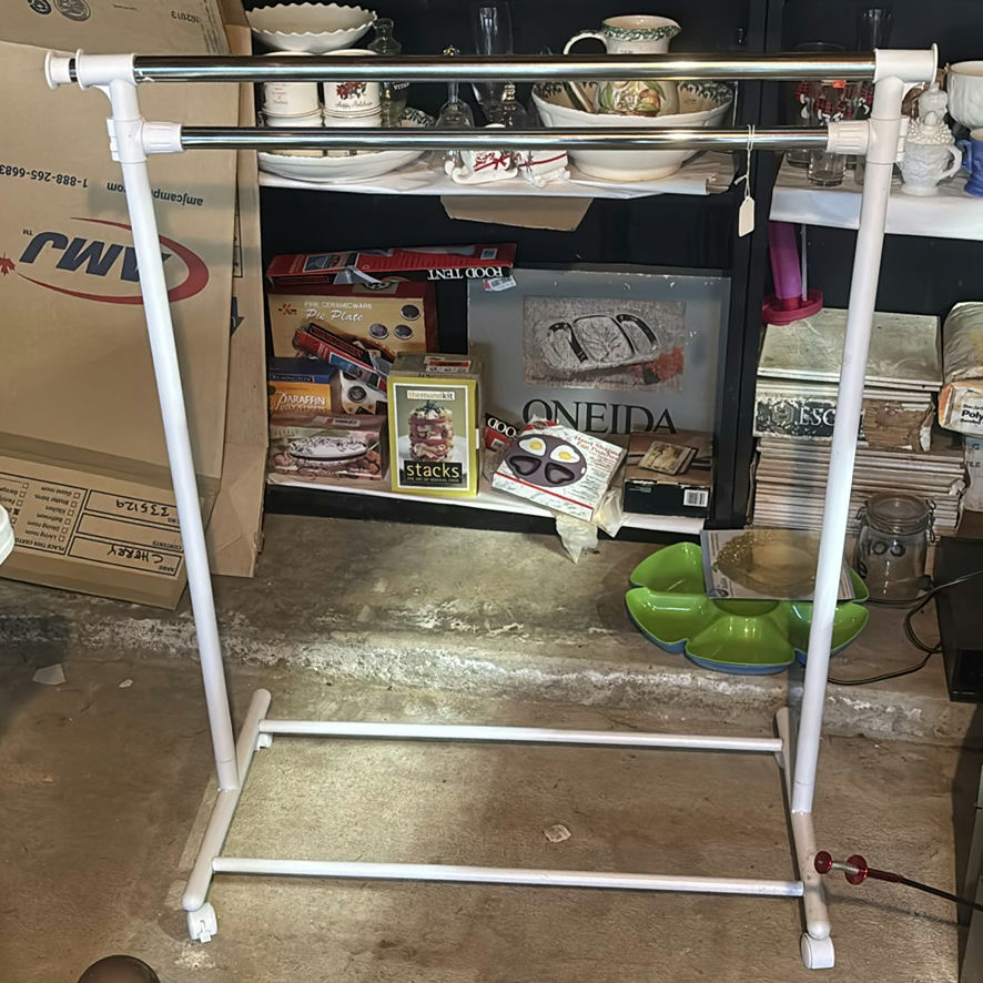 White metal clothing rack - image 1 of 3
