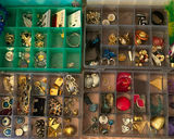 Assorted jewelry in a multi-compartment organizer - thumbnail 1 of 13