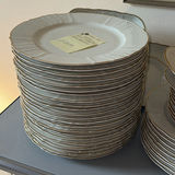 Porcelain dinnerware set with gold-edged plates, bowls, saucers, and cups - thumbnail 2 of 9