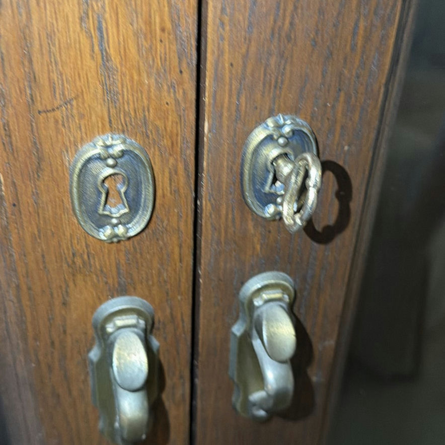 Dark wood gun cabinet with glass doors - image 4 of 7