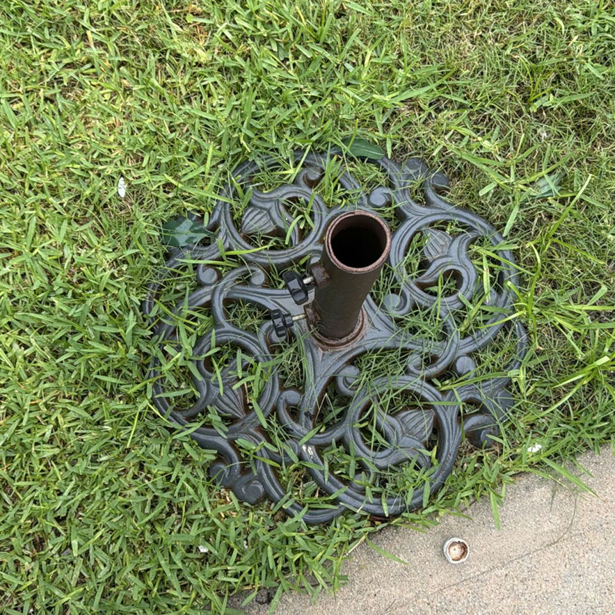 Ornate garden planters and iron umbrella stand - image 5 of 5