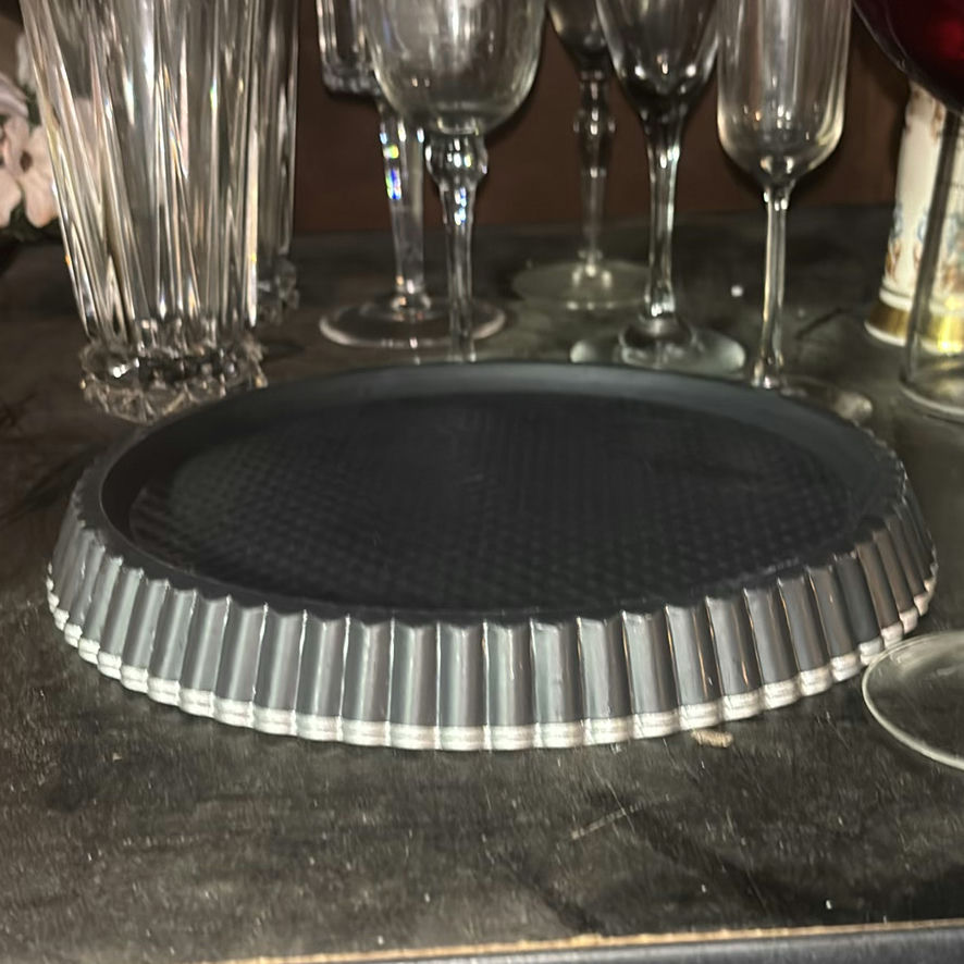 Assorted glassware with burgundy wine glass, red candle, and orange ridged baking mold - image 3 of 8
