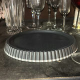 Assorted glassware with burgundy wine glass, red candle, and orange ridged baking mold - thumbnail 3 of 8