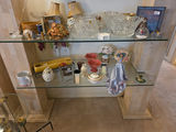 Vintage glassware and porcelain figurine collection on glass shelves - thumbnail 5 of 5