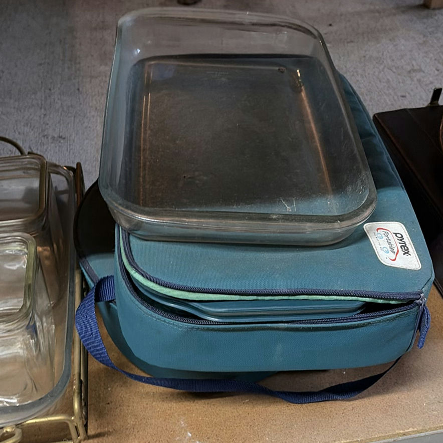 Glass bakeware, ornate wooden tray, and leather roll organizer - image 2 of 6