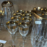 Assorted glassware: champagne flutes, wine glasses, goblets, and a crystal pitcher - thumbnail 8 of 8